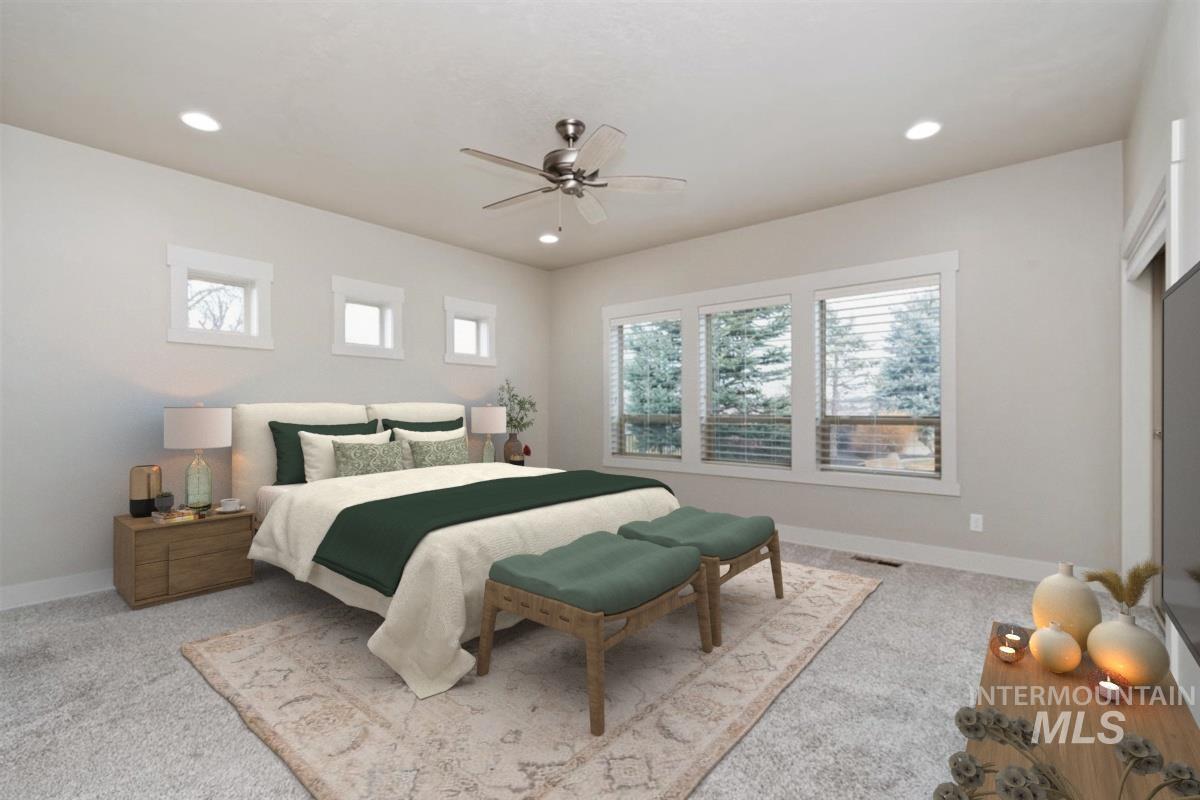 9580 West Ringle Creek Street Star, ID 83669 - Photo 23 of 43 Bedroom with light colored carpet and a ceiling fan