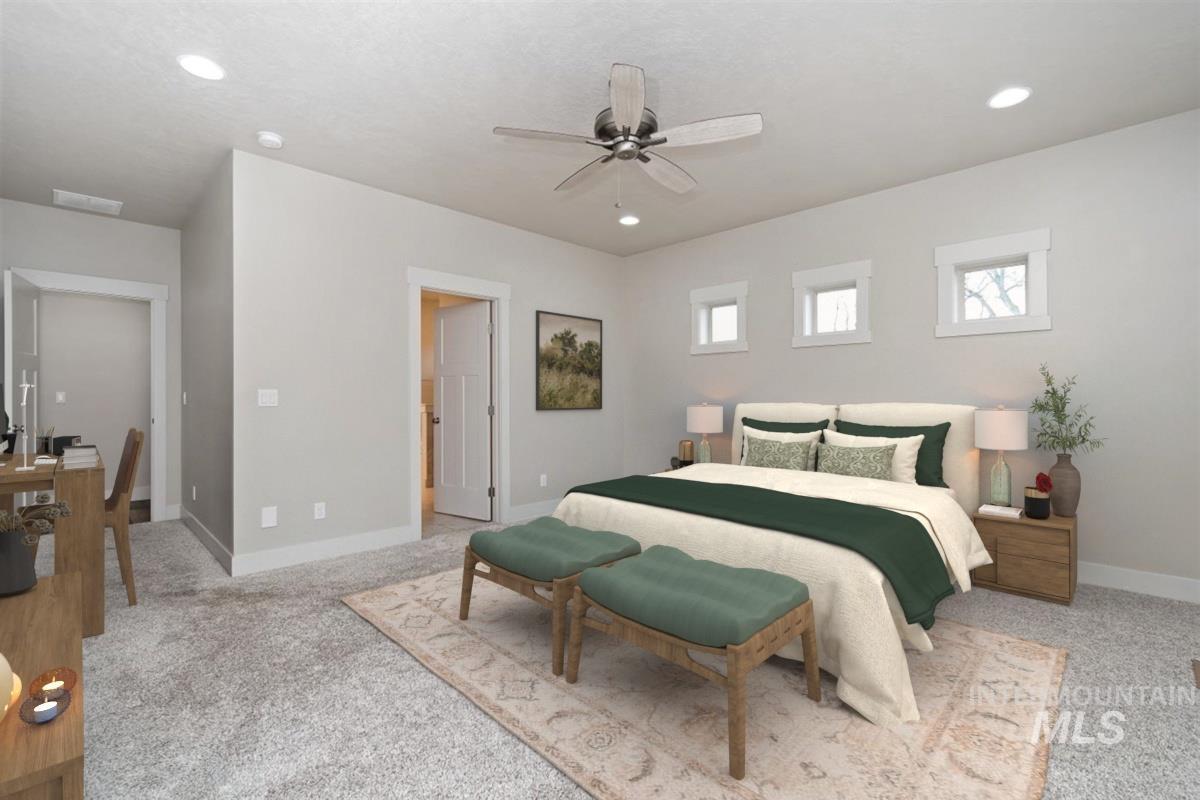 9580 West Ringle Creek Street Star, ID 83669 - Photo 24 of 43 Bedroom with light carpet and a ceiling fan