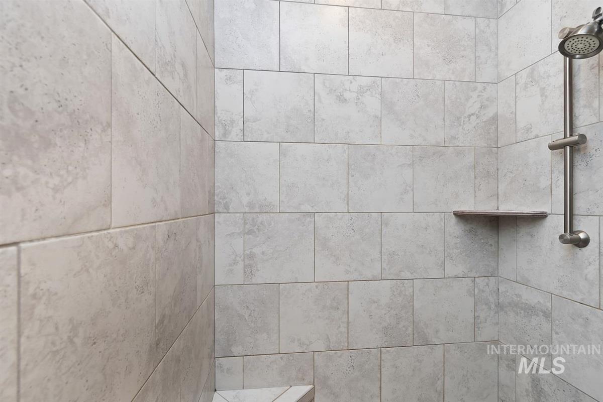 9580 West Ringle Creek Street Star, ID 83669 - Photo 29 of 43 Bathroom view of a tile shower