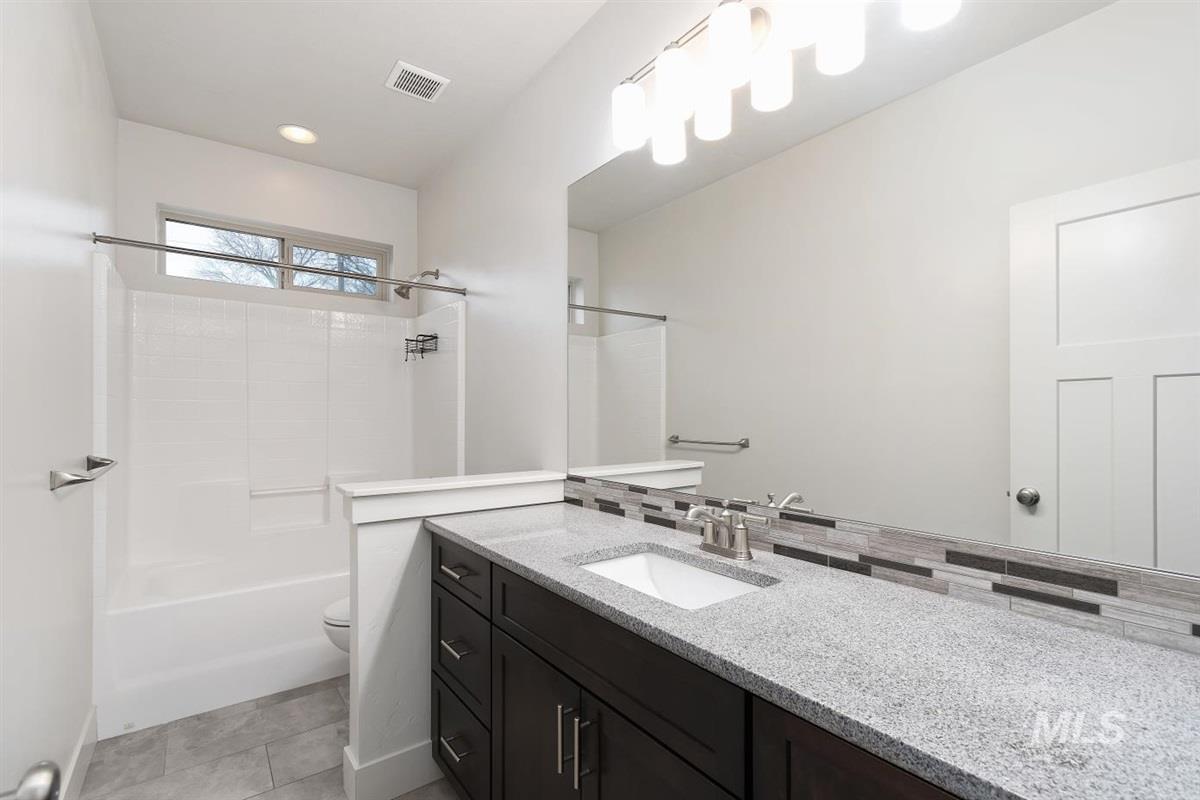 9580 West Ringle Creek Street Star, ID 83669 - Photo 32 of 43 Full bathroom featuring vanity and shower / bathtub combination