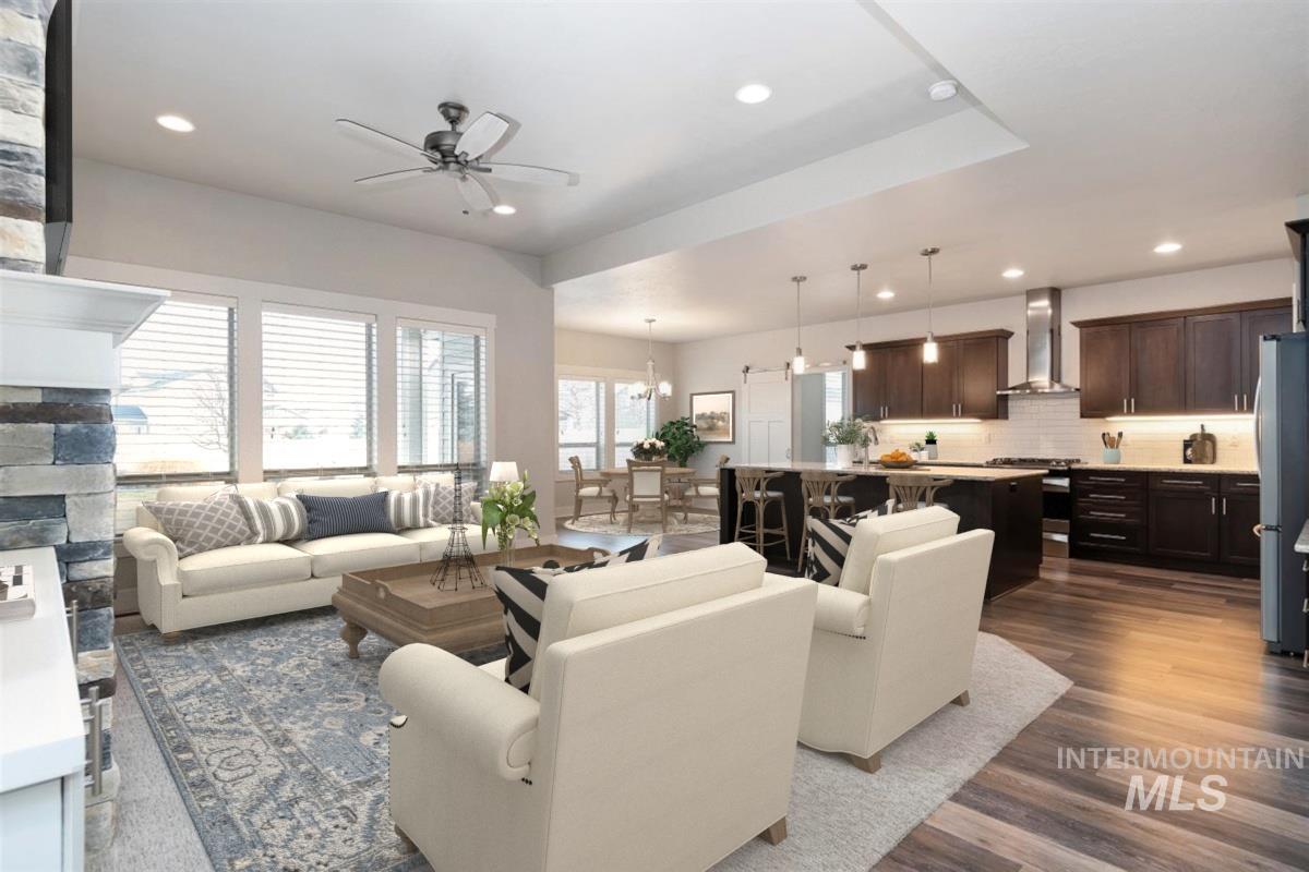 9580 West Ringle Creek Street Star, ID 83669 - Photo 6 of 43 Living room with a ceiling fan, dark wood finished floors, and recessed lighting
