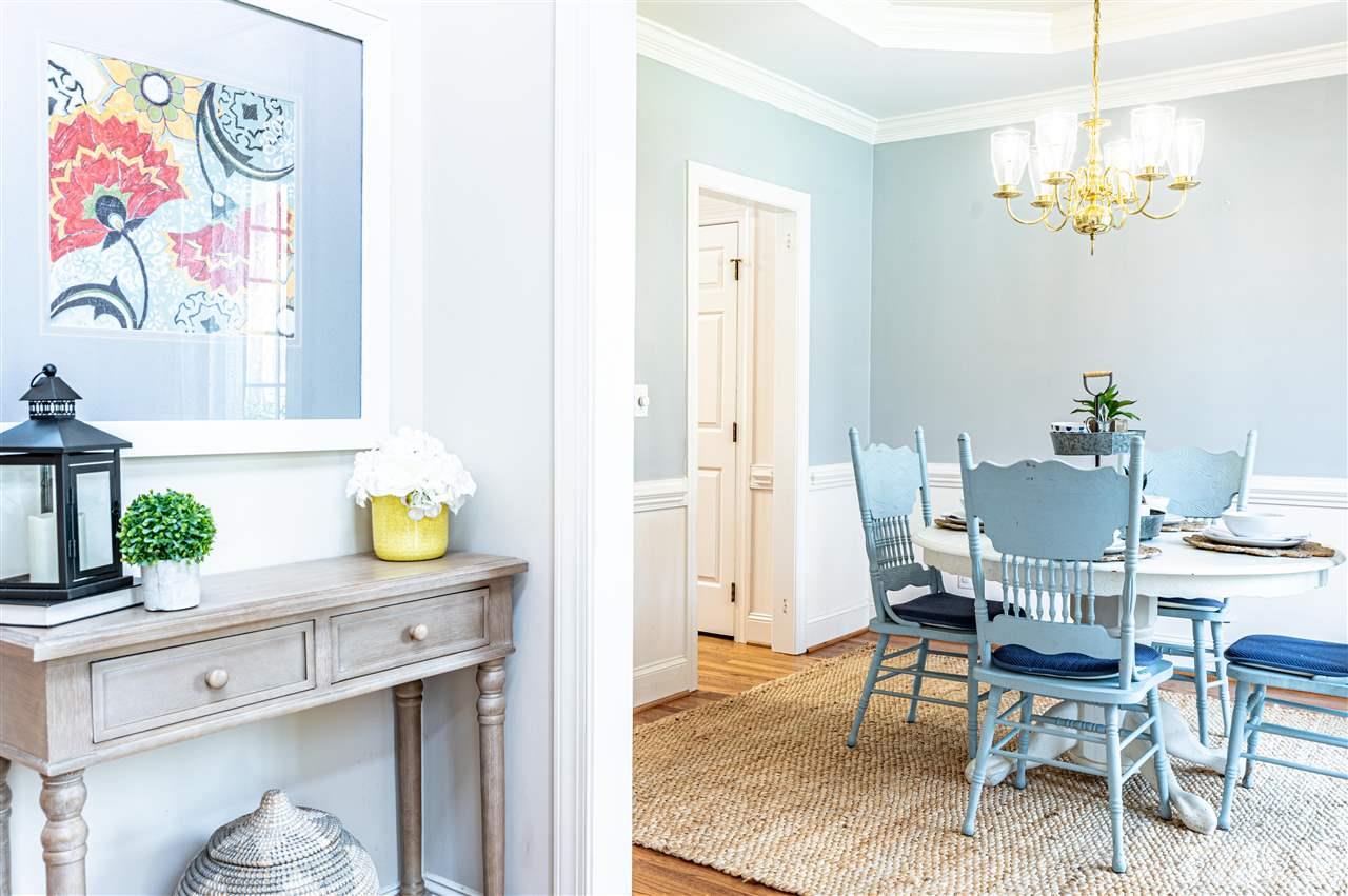 6208 Hampton Ridge Road Raleigh, NC 27603 - Photo 11 of 30 a view of a dining room with furniture