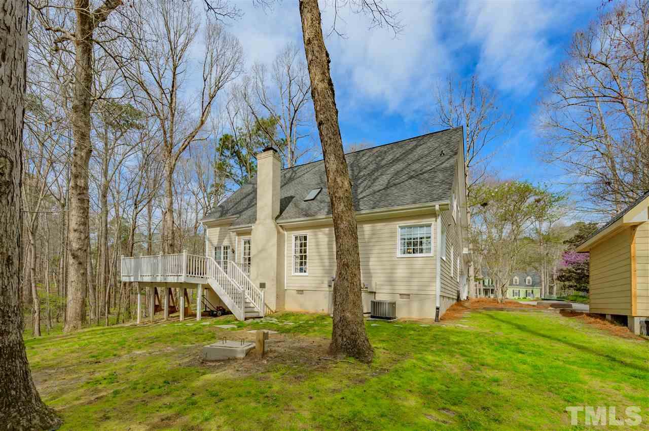 6208 Hampton Ridge Road Raleigh, NC 27603 - Photo 30 of 30 a view of a house with a yard