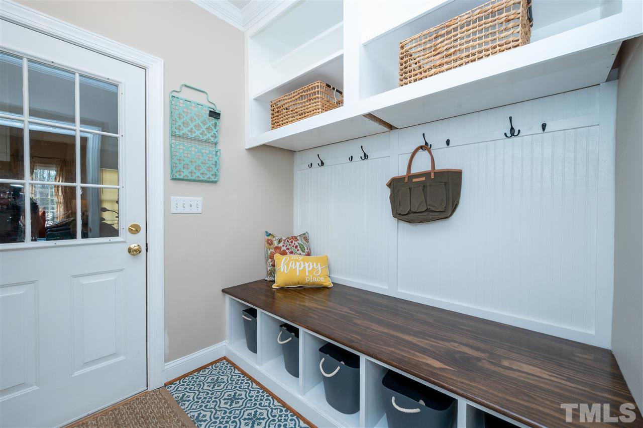 6208 Hampton Ridge Road Raleigh, NC 27603 - Photo 6 of 30 a view of entryway with wooden floor