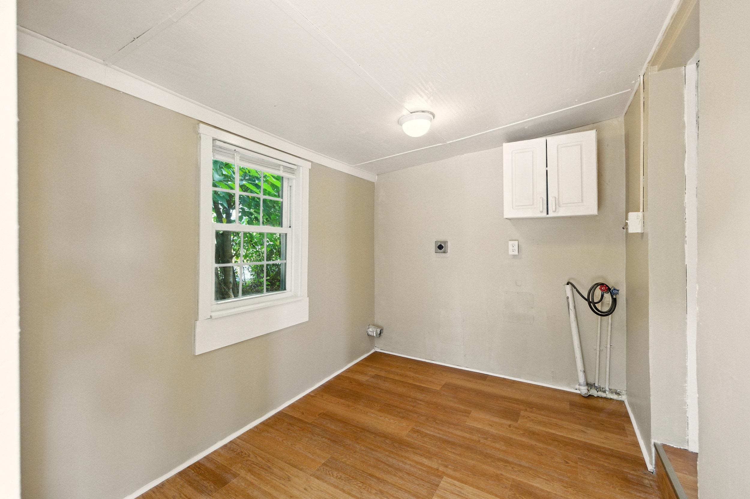 17801 Red Brush Road Elkton, VA 22827 - Photo 19 of 48 a view of empty room with wooden floor and fan