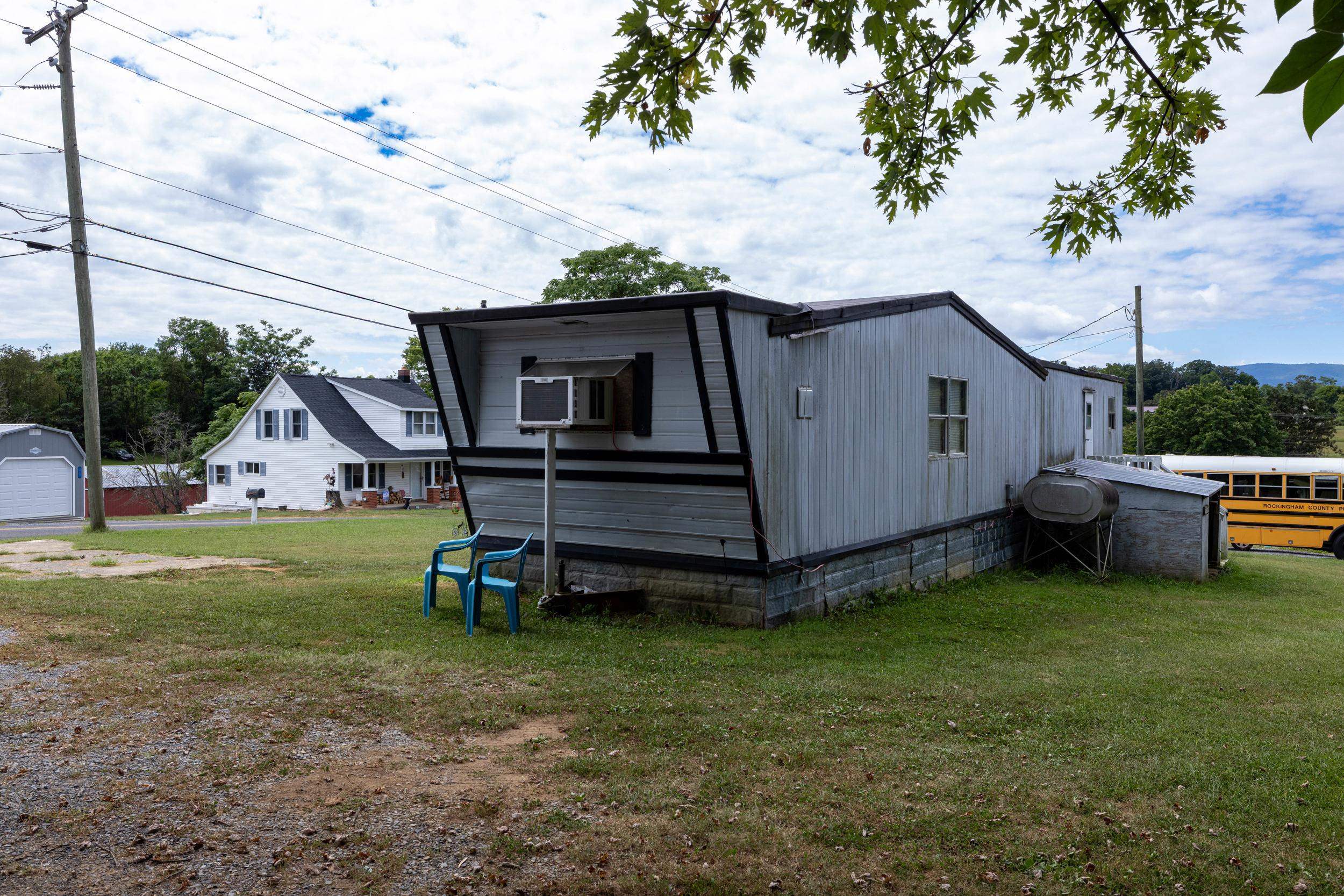 17801 Red Brush Road Elkton, VA 22827 - Photo 43 of 48 a view of a backyard with wooden fence and a bench