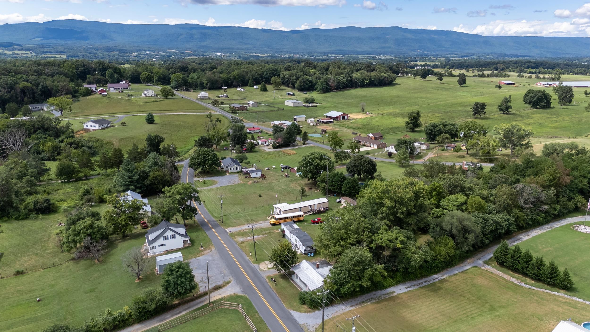 17801 Red Brush Road Elkton, VA 22827 - Photo 46 of 48 a view of a lush green hillside and houses