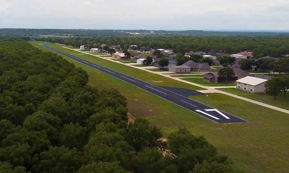 8201 Ravenswood Road Granbury, TX 76049 - Photo 13 of 17 an aerial view of a city