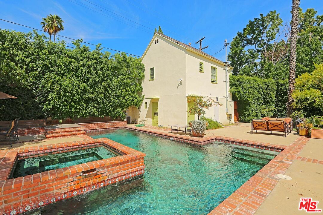 602 North Camden Drive Beverly Hills, CA 90210 - Photo 16 of 18 swimming pool view with a outdoor seating