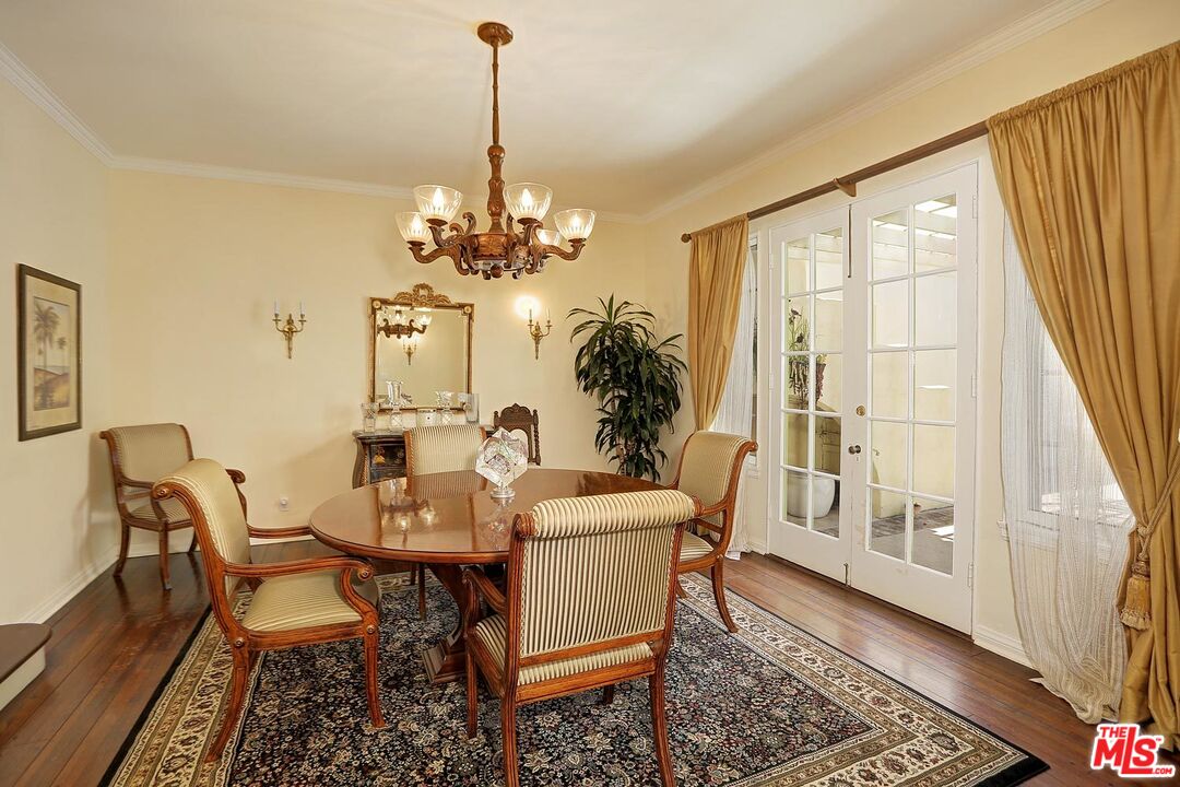 602 North Camden Drive Beverly Hills, CA 90210 - Photo 4 of 18 a view of a dining room with furniture window and wooden floor