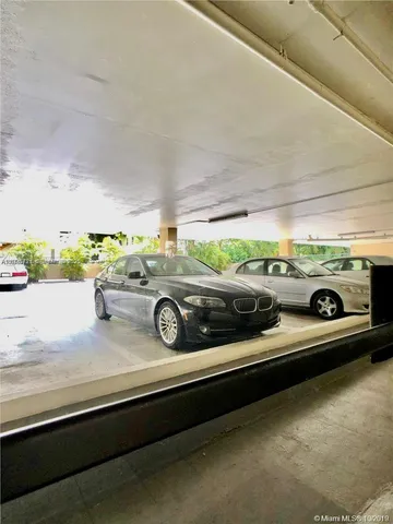 a view of a balcony with a pot