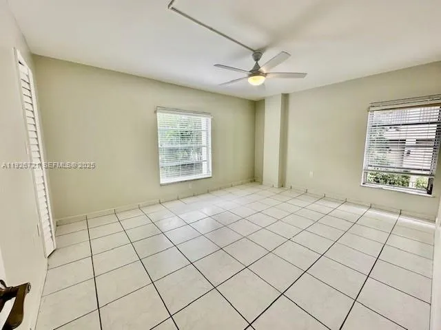 a bathroom with a sink a toilet and a shower