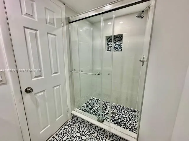 a view of a outdoor space with swimming pool