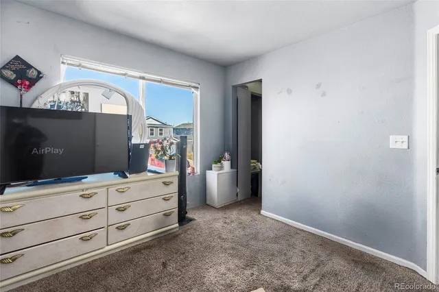 a view of room with cabinet and mirror