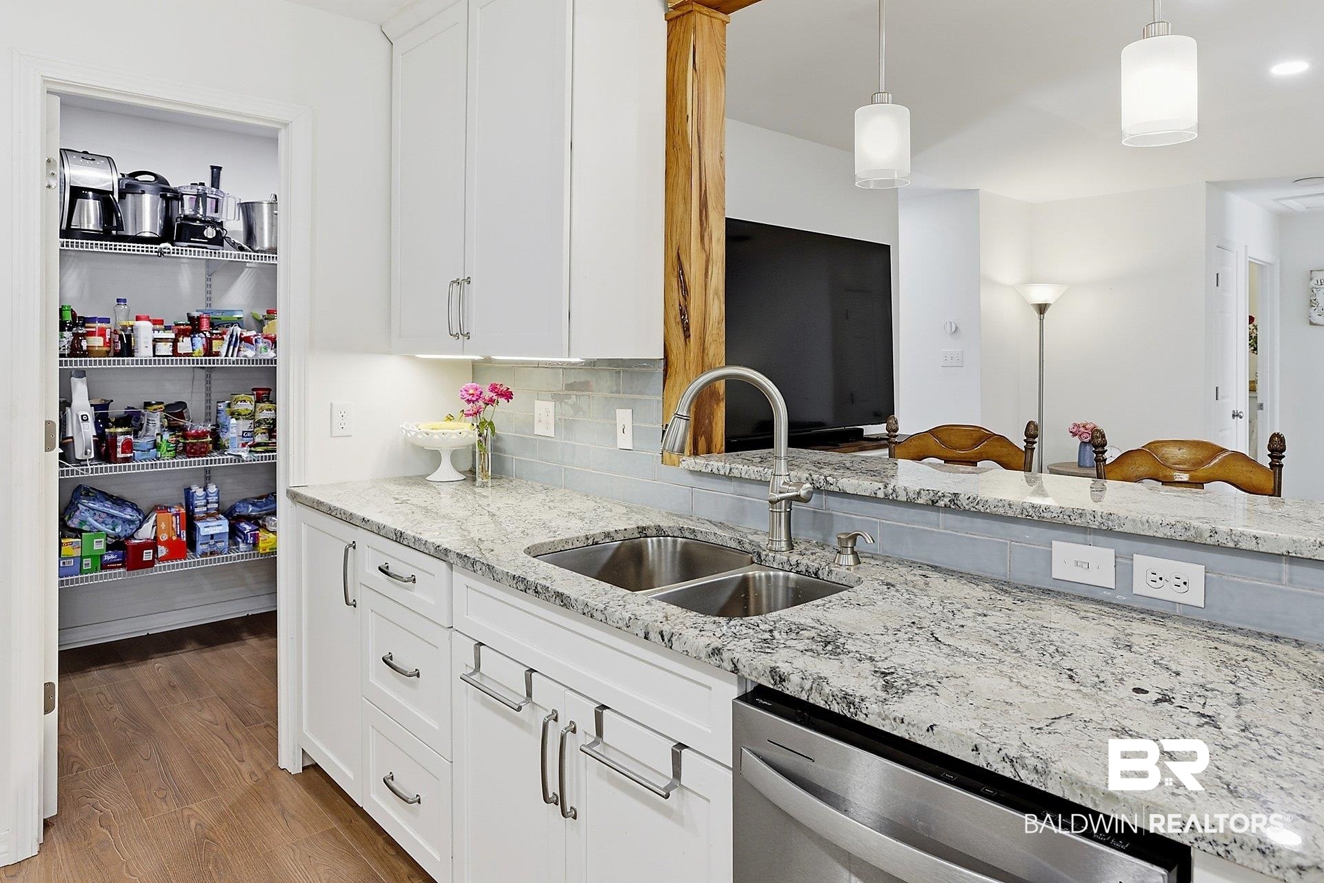 25793 Bonito Avenue Orange Beach, AL 36561 - Photo 12 of 27 Kitchen has a large pantry with plenty of storage