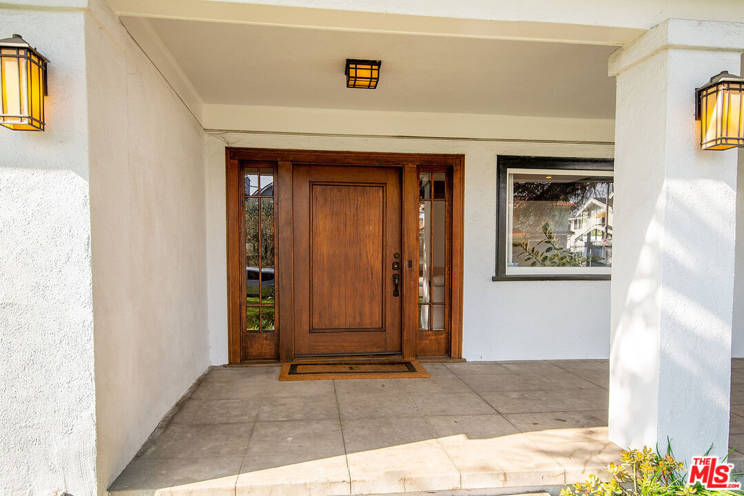 1927 Buckingham Road Los Angeles, CA 90016 - Photo 4 of 36 a view of front door of house