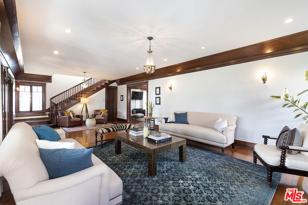 1927 Buckingham Road Los Angeles, CA 90016 - Photo 6 of 36 a living room with furniture and wooden floor