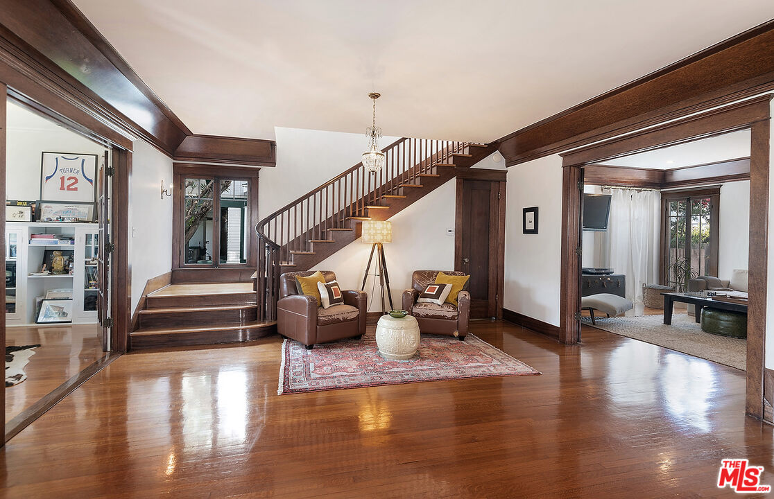 1927 Buckingham Road Los Angeles, CA 90016 - Photo 7 of 36 a view of entryway and hall with wooden floor
