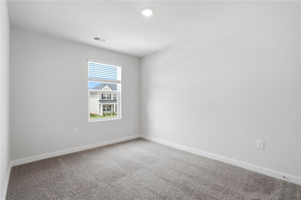 5351 Tolar Road South Fulton, GA 30213 - Photo 16 of 30 an empty room with a window
