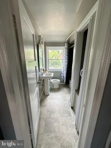 a view of a room with a furniture