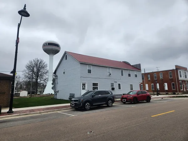 a view of a cars parked in front of a building