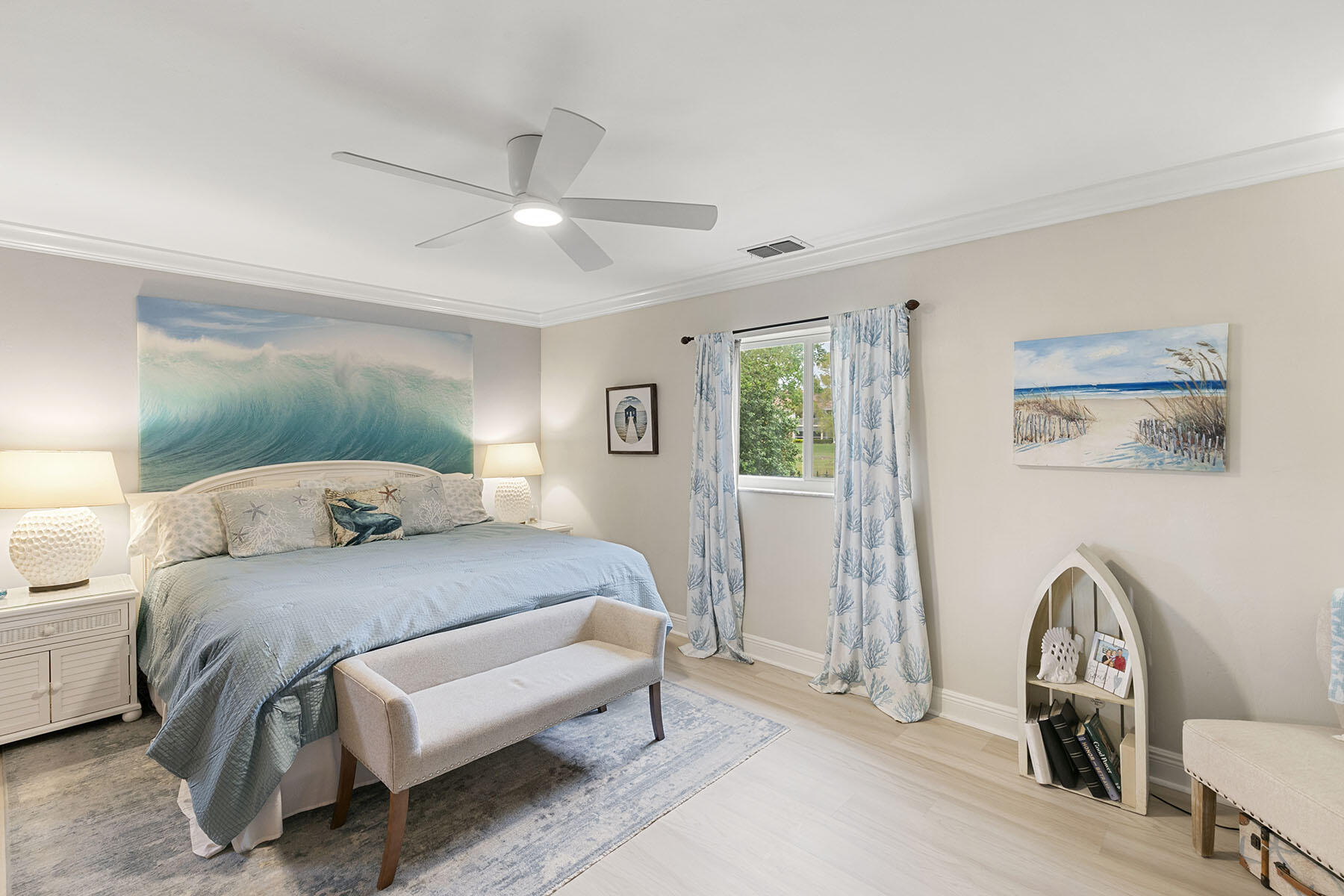 159 Plantation Circle Naples, FL 34104 - Photo 17 of 38 a bedroom with a bed couch and a window