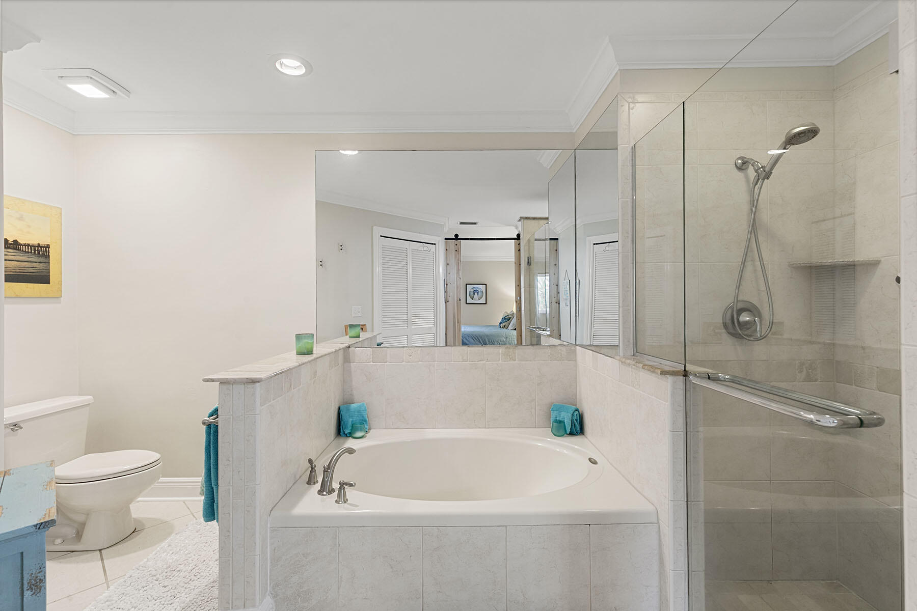 159 Plantation Circle Naples, FL 34104 - Photo 20 of 38 a white bath tub sitting next to a white toilet and a shower