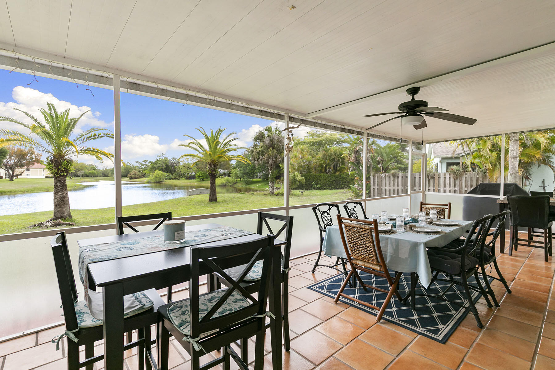 159 Plantation Circle Naples, FL 34104 - Photo 2 of 38 a view of a dining room with furniture window and outside view