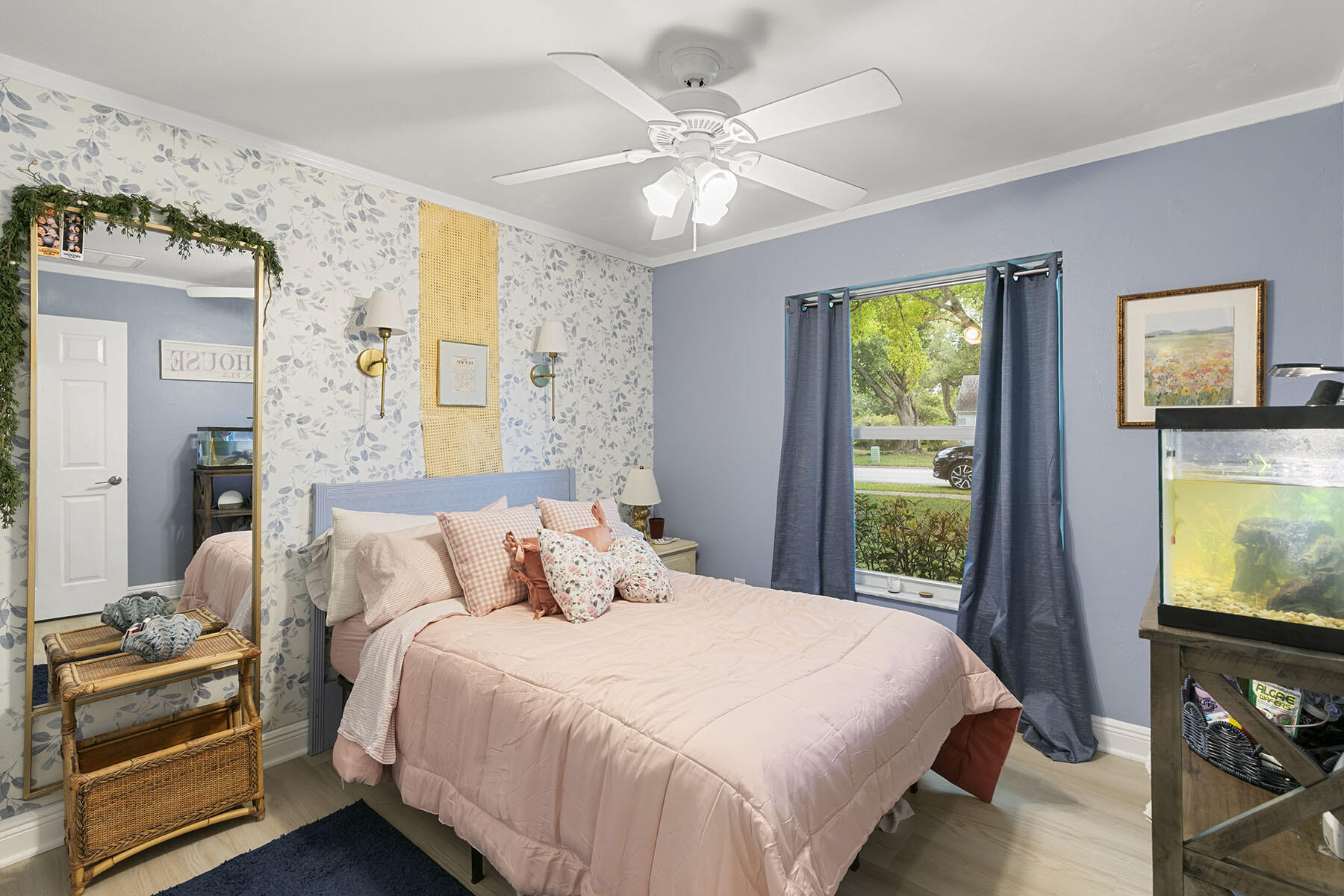 159 Plantation Circle Naples, FL 34104 - Photo 21 of 38 a bedroom with a bed a dresser next to a window