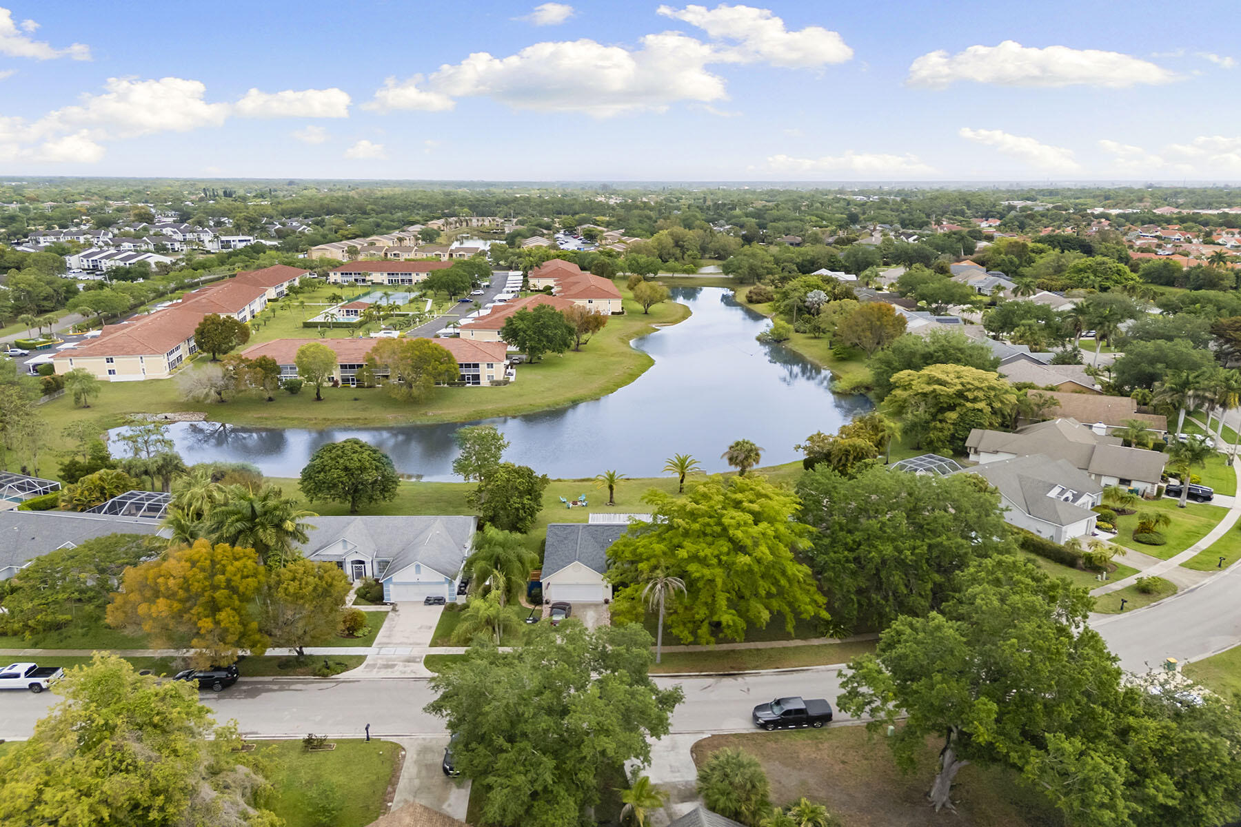 159 Plantation Circle Naples, FL 34104 - Photo 30 of 38 an aerial view of ocean and residential houses with outdoor space