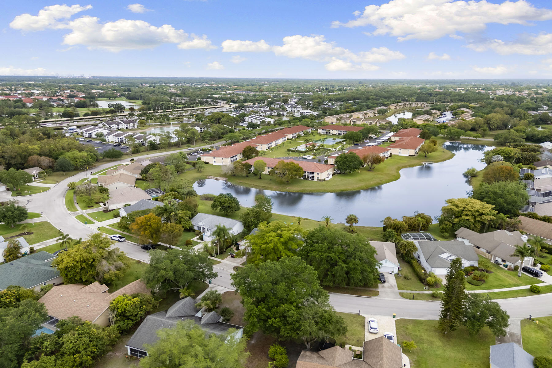 159 Plantation Circle Naples, FL 34104 - Photo 38 of 38 an aerial view of residential houses with outdoor space