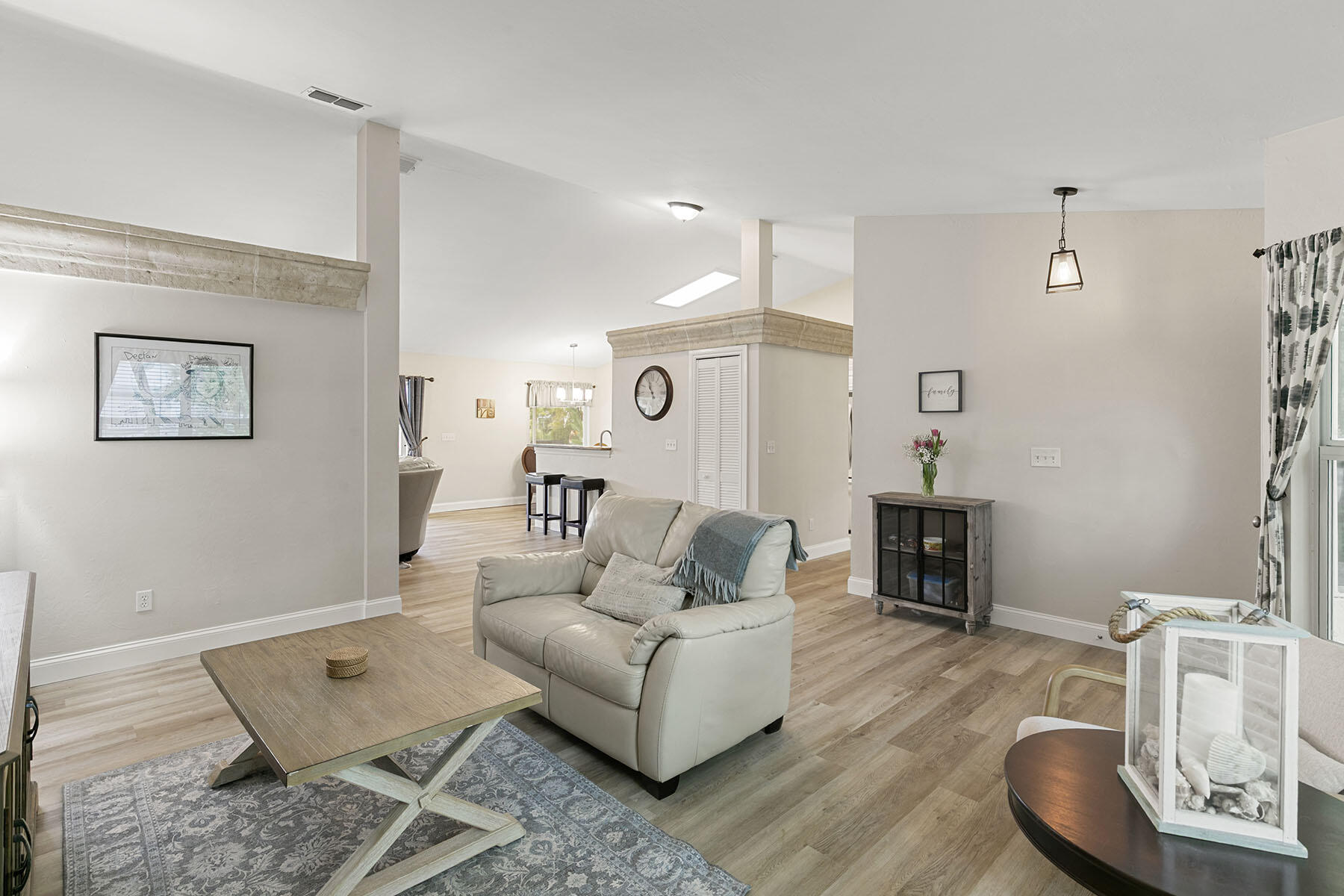 159 Plantation Circle Naples, FL 34104 - Photo 10 of 38 a living room with furniture and wooden floor