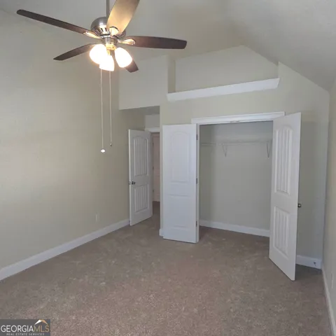 a bathroom with a sink vanity and mirror