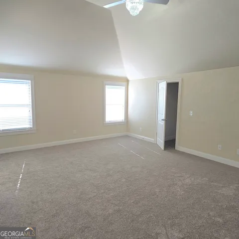 a view of a livingroom with a staircase