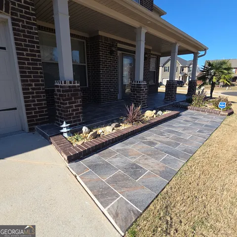 a view of a house with sitting area