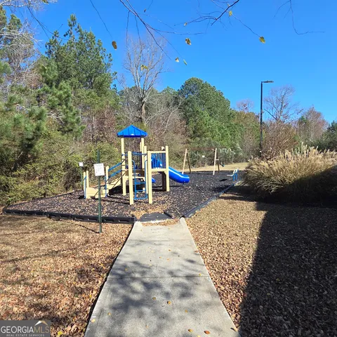 a view of a house with a street