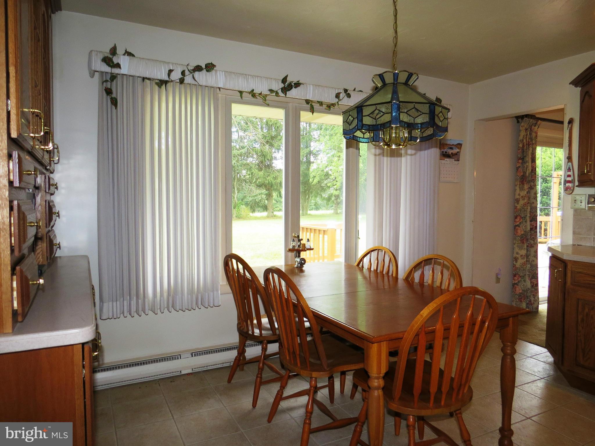 3562 Water Tank Road Manchester, MD 21102 - Photo 8 of 29 a view of a dining room with furniture window and outside view