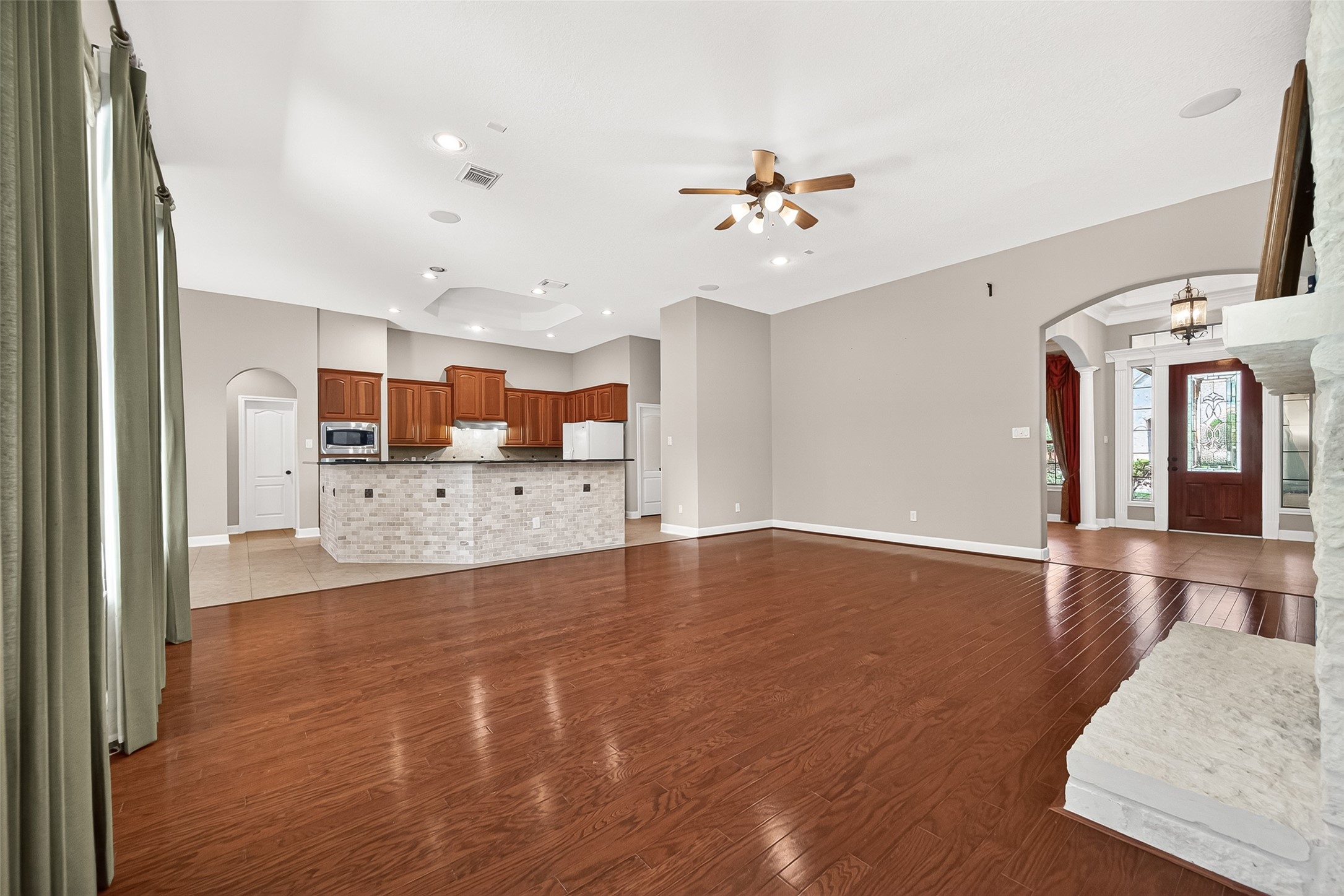 2310 Spring Lake Park Lane Spring, TX 77386 - Photo 13 of 47 a view of kitchen and hall with wooden floor