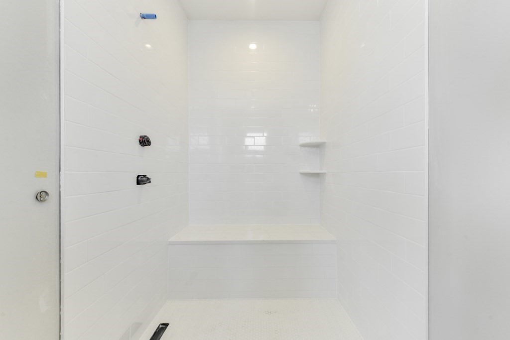 14 Ennis Road, Unit REAR Boston, MA 02119 - Photo 17 of 26 a bathroom with a shower