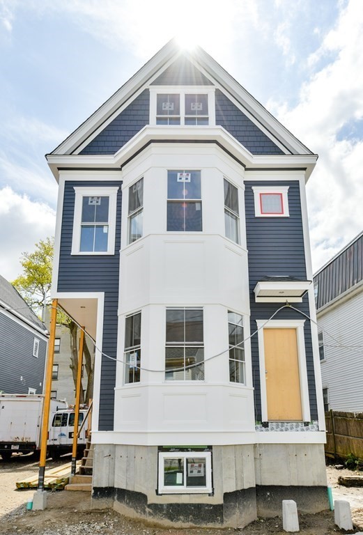 14 Ennis Road, Unit REAR Boston, MA 02119 - Photo 25 of 26 a front view of a house