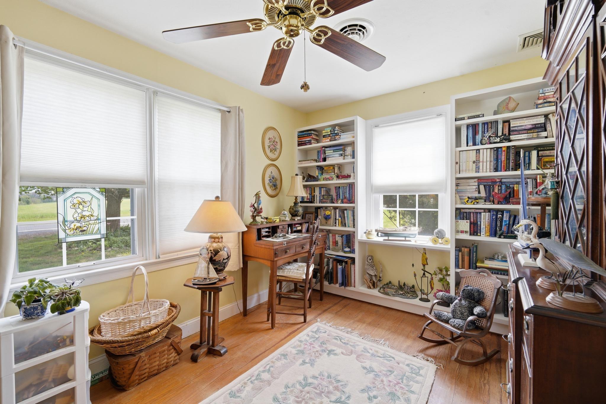 14136 Kentmore Park Road Kennedyville, MD 21645 - Photo 18 of 54 a view of a livingroom with workspace and a window