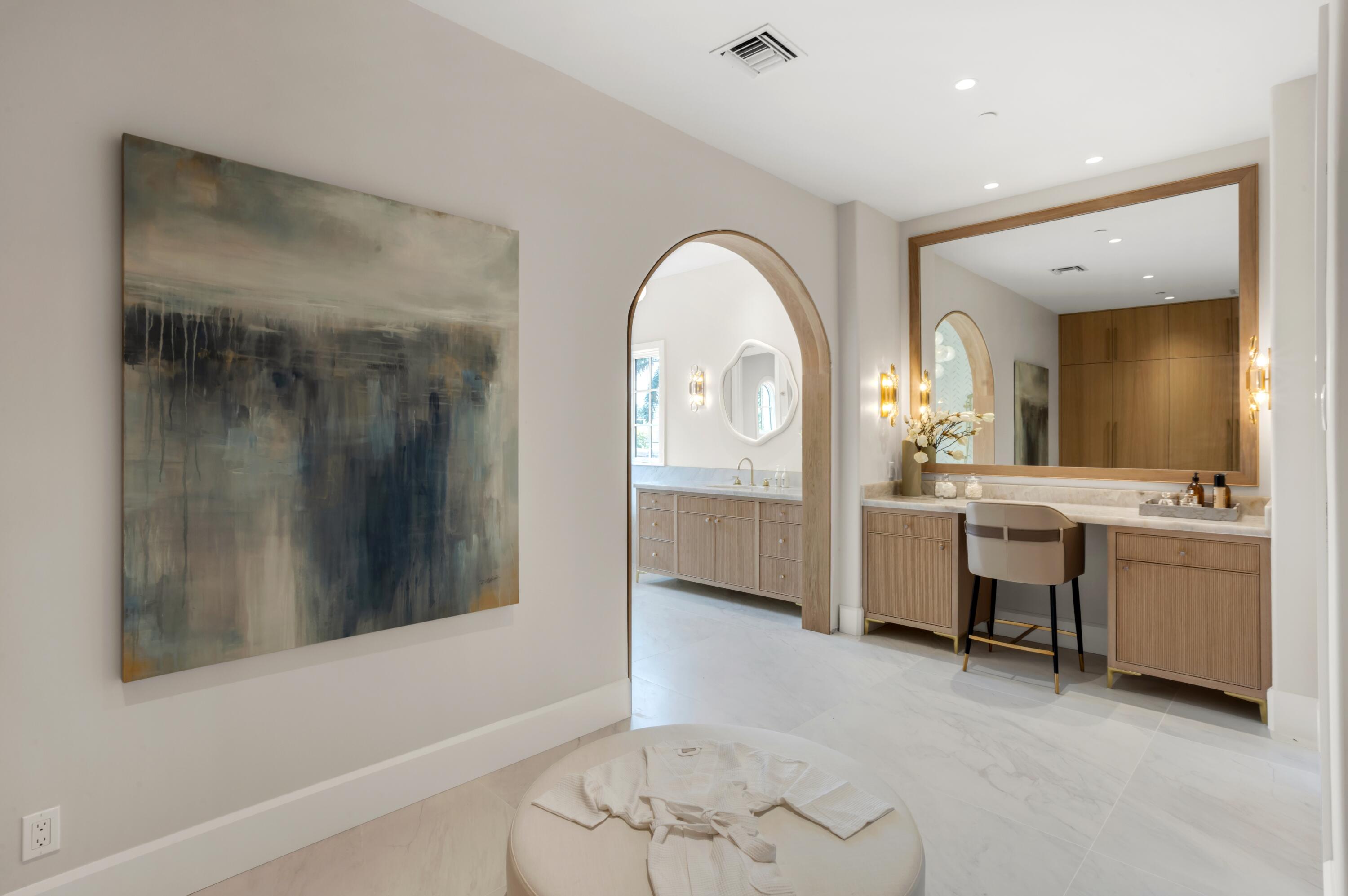 1203 Spanish River Road Boca Raton, FL 33432 - Photo 11 of 30 a view of a bathroom with sink mirror and bathtub
