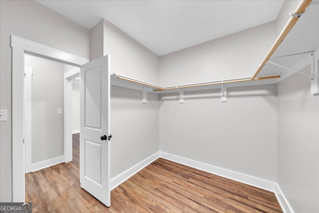 2769 Claxton Dairy Road Dublin, GA 31021 - Photo 26 of 48 a view of a room with wooden floor and white walls