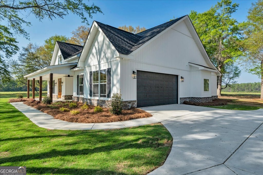 2769 Claxton Dairy Road Dublin, GA 31021 - Photo 39 of 48 a view of a house with entertaining space