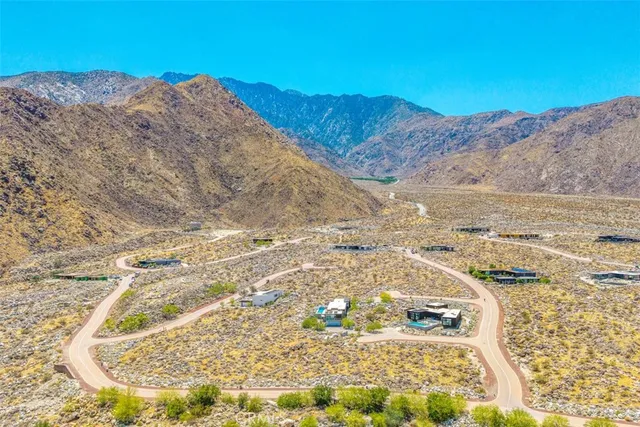 a view of a garden with a pathway
