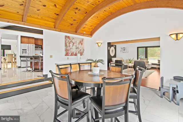 a bathroom with a tub and a shower