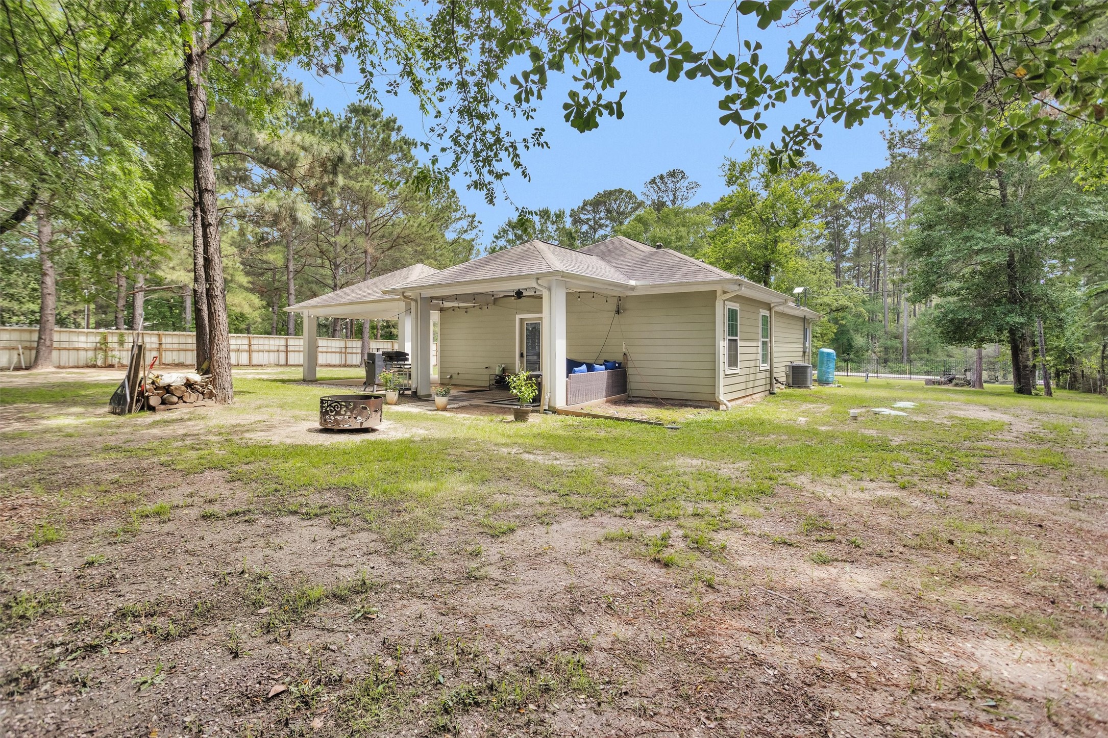 30806 Mellman Road Hempstead, TX 77445 - Photo 23 of 35 Fully fenced yard and so much room for a garden, an RV, family gatherings.