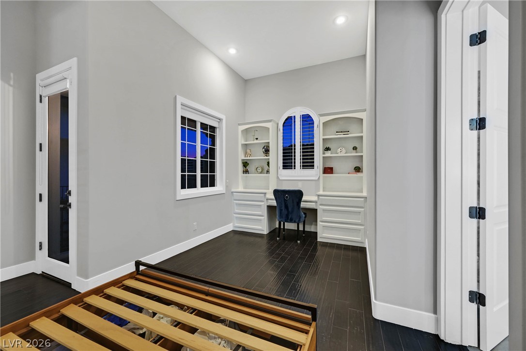 6 Rue Du Ville Henderson, NV 89011 - Photo 65 of 99 This versatile room boasts built-in shelving, perfect for a productive workspace or a cozy retreat.