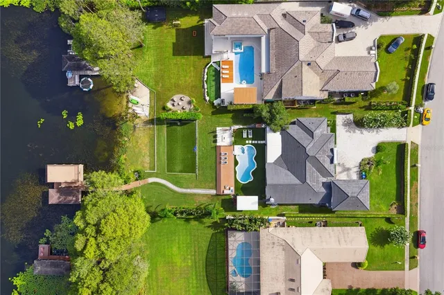 an aerial view of a houses with outdoor space