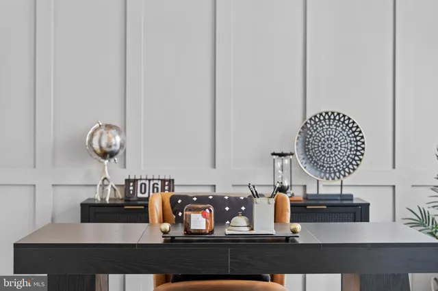 a large kitchen with stainless steel appliances granite countertop a lot of counter space and wooden floors